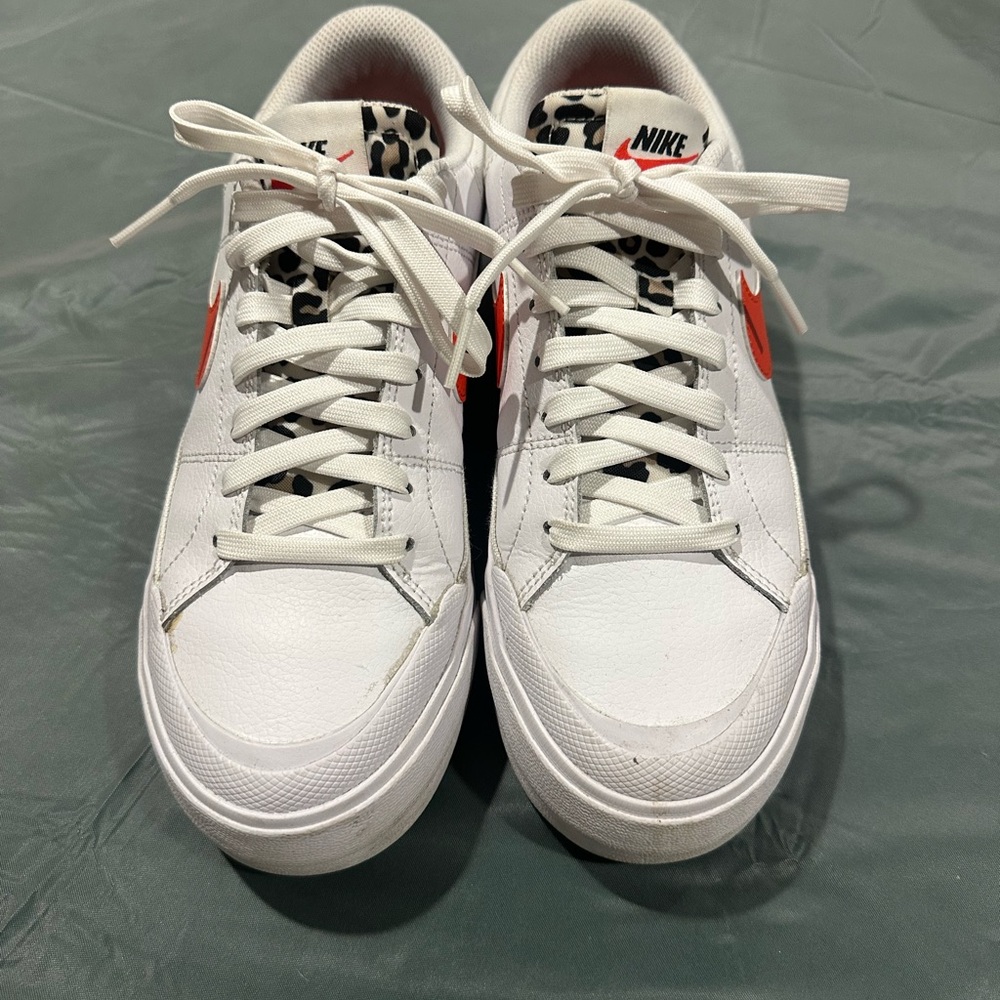 Nike White Sneakers with Animal Print and Red Swoosh